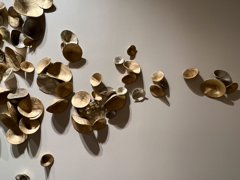 Direct to wall installation for Four Season Atlanta Spa, custom paperclay Cuppies in mixed metallics, approximately 18" x 72" area | Consulting by Canvas Atlanta