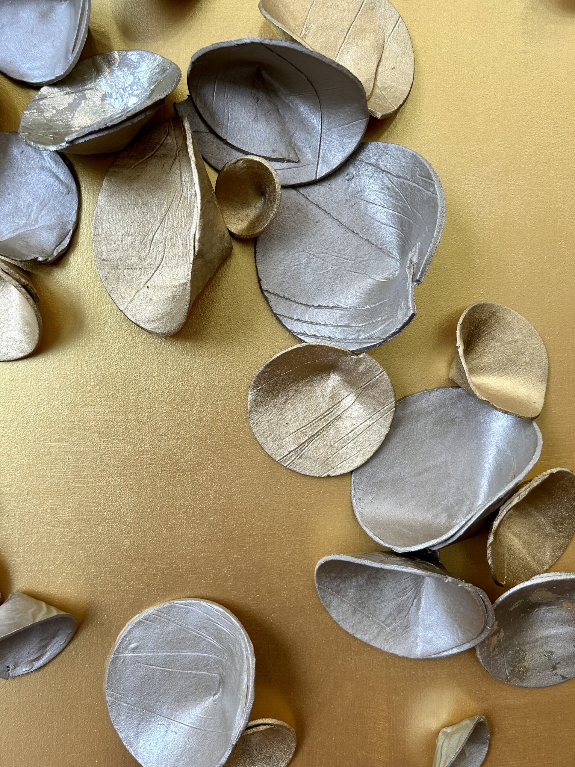 custom paperclay cuppies commission in mixed metallics with champagne metal leaf accents, on gold backer | 46"H x 34"W