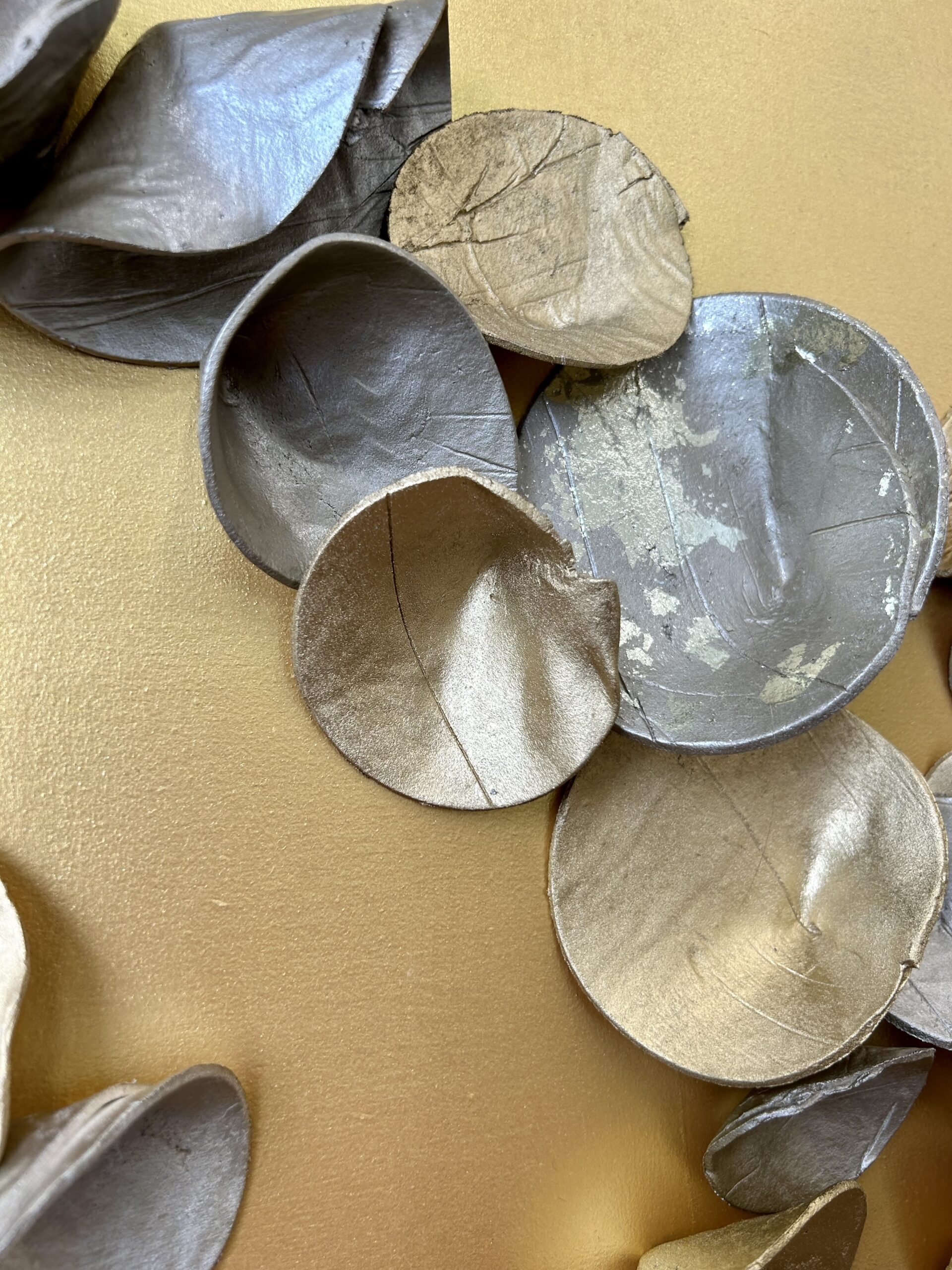 custom paperclay cuppies commission in mixed metallics with champane metal leaf accents, on gold backer | 46"H x 34"W