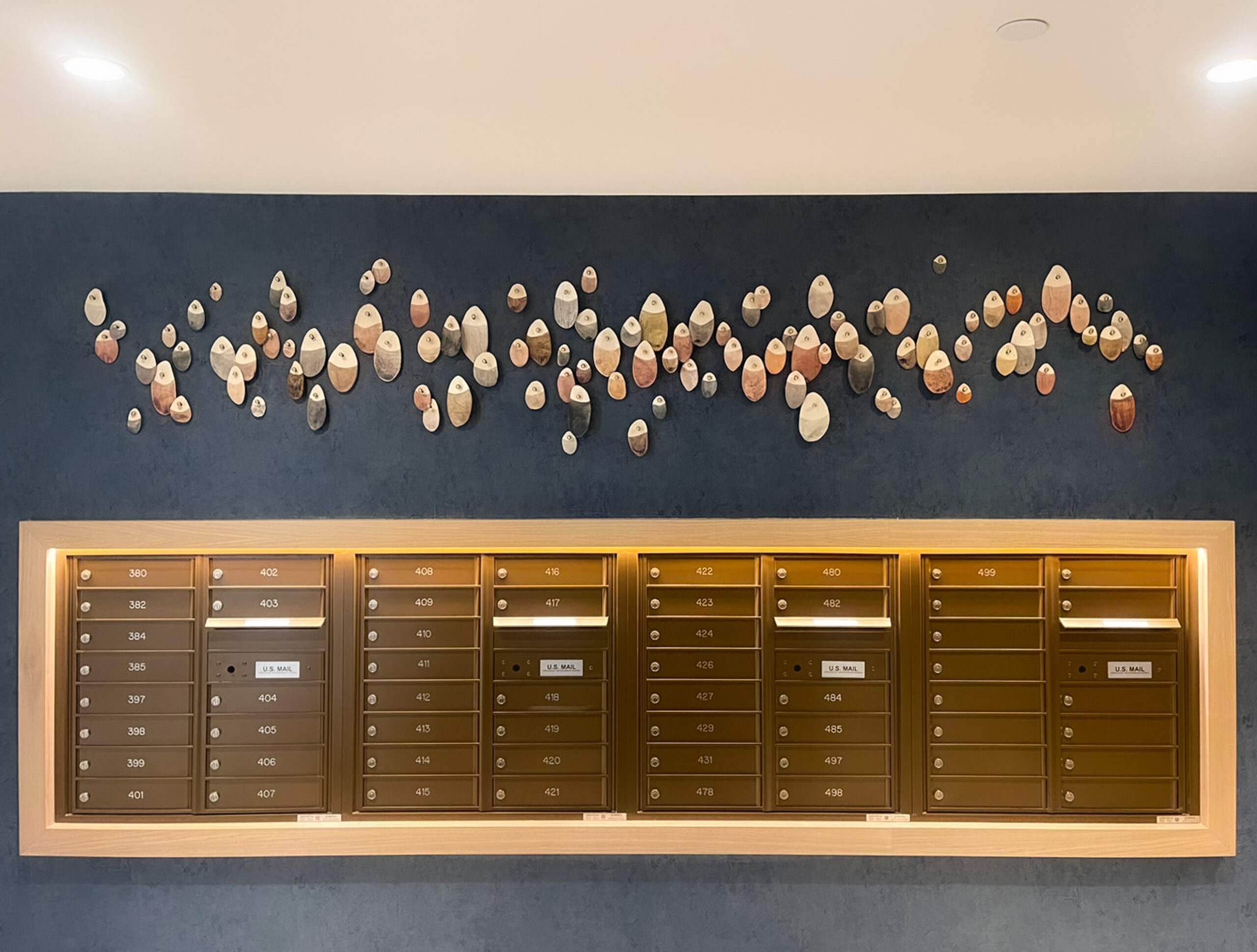 Custom Drops Installation, paperclay, watercolor, hardware, install area approx 36h x 96”w, installed at Avalon Montville, consulting by Parade