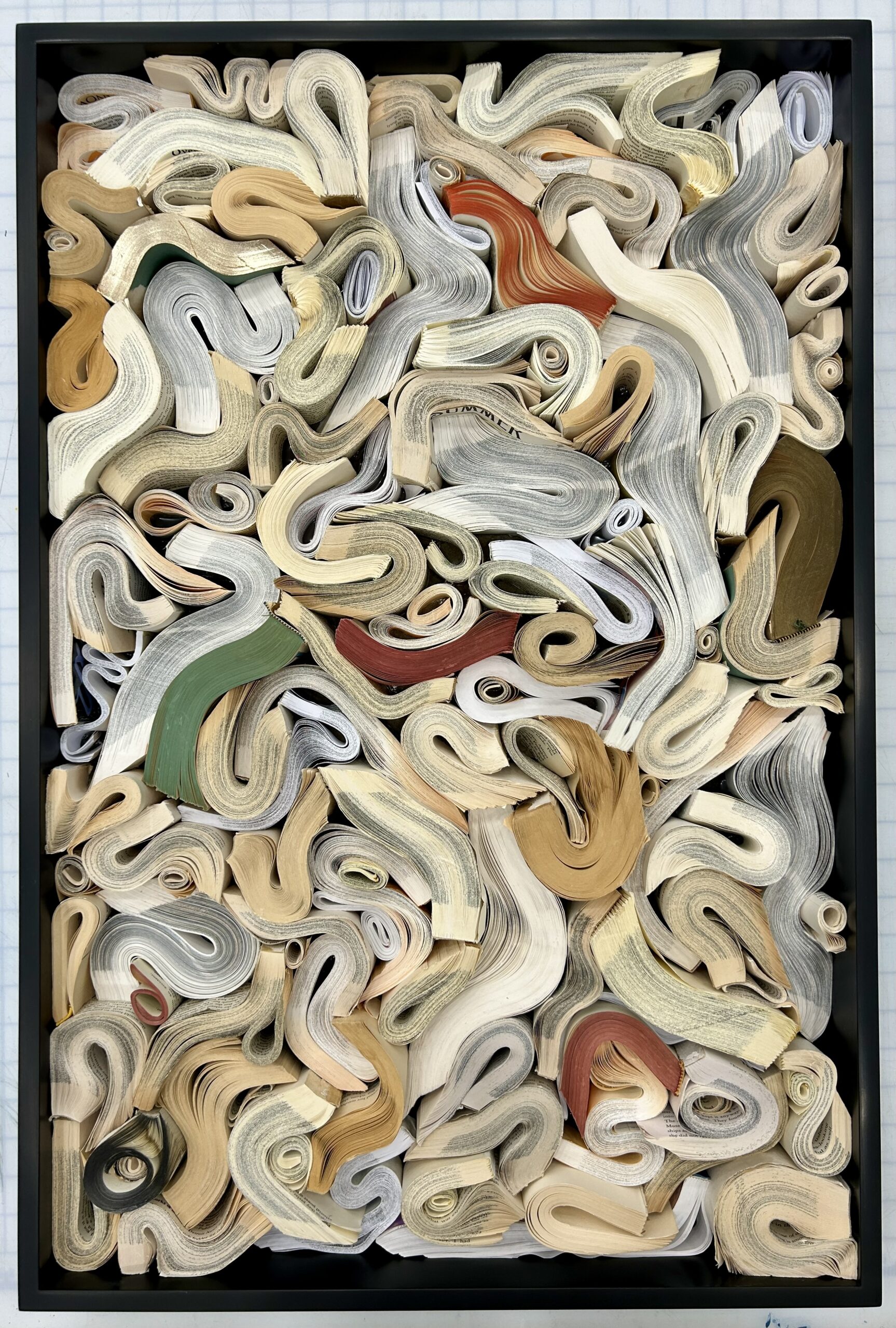 custom cut book assemblage in handmade frame with black finish, 30"H x 20"W