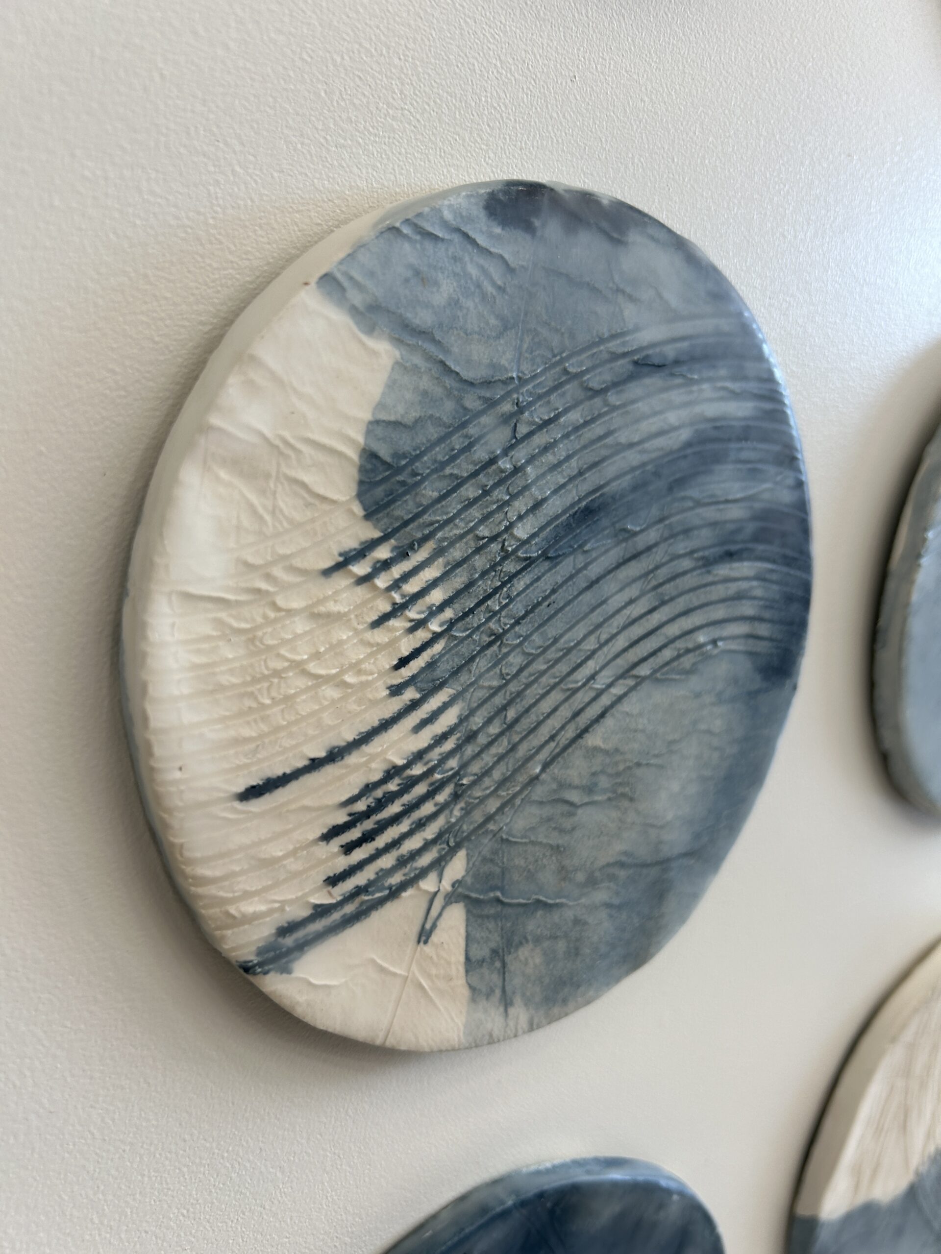 Emily Mann, Ink and Indigo, Custom Commisioned Paperclay and Encaustic Disks on Panel, set of 4, 38x38 each, custom art for luxury hospitality suites
