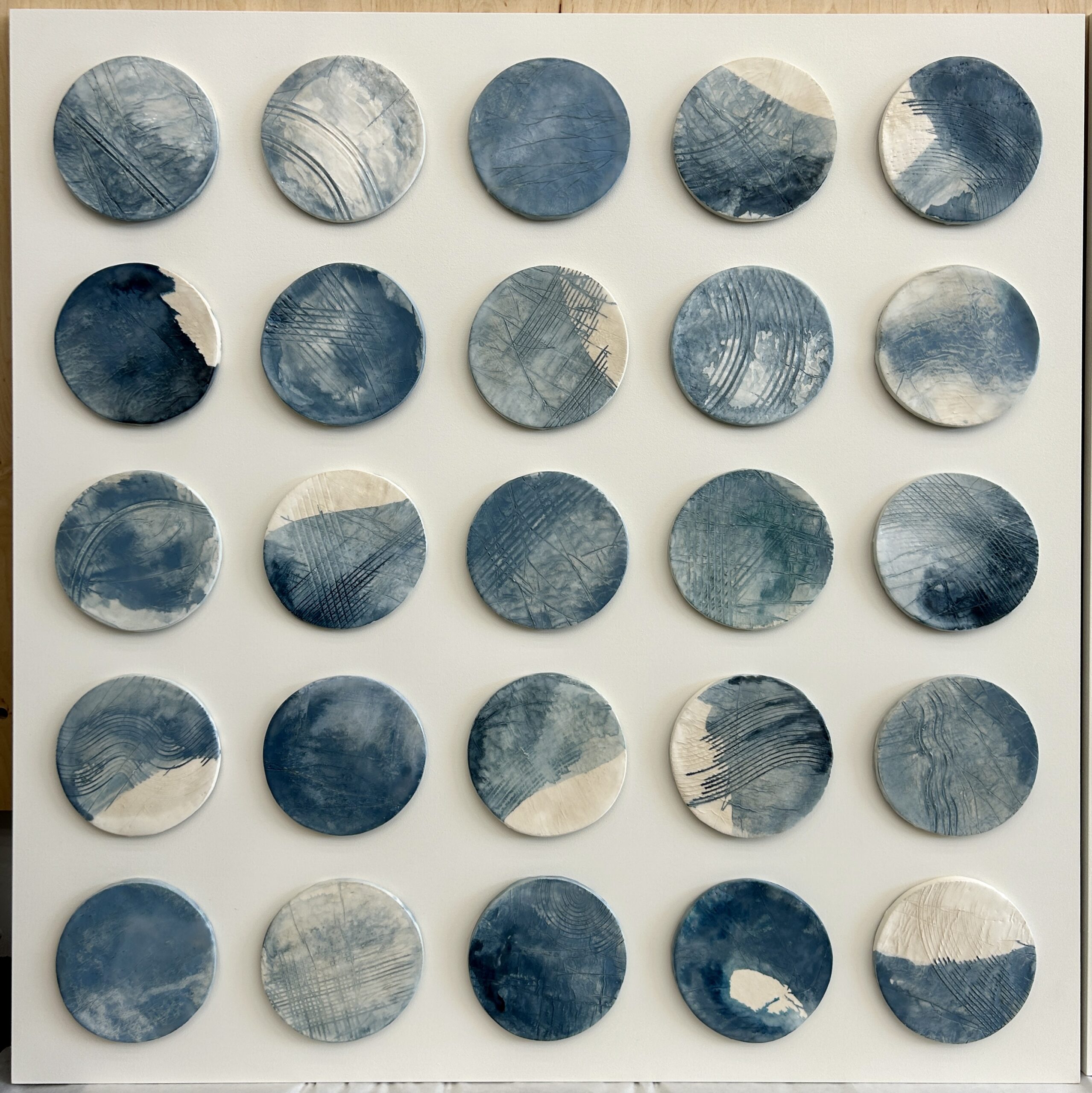 Emily Mann, Ink and Indigo, Custom Commisioned Paperclay and Encaustic Disks on Panel, set of 4, 38x38 each, custom art for luxury hospitality suites