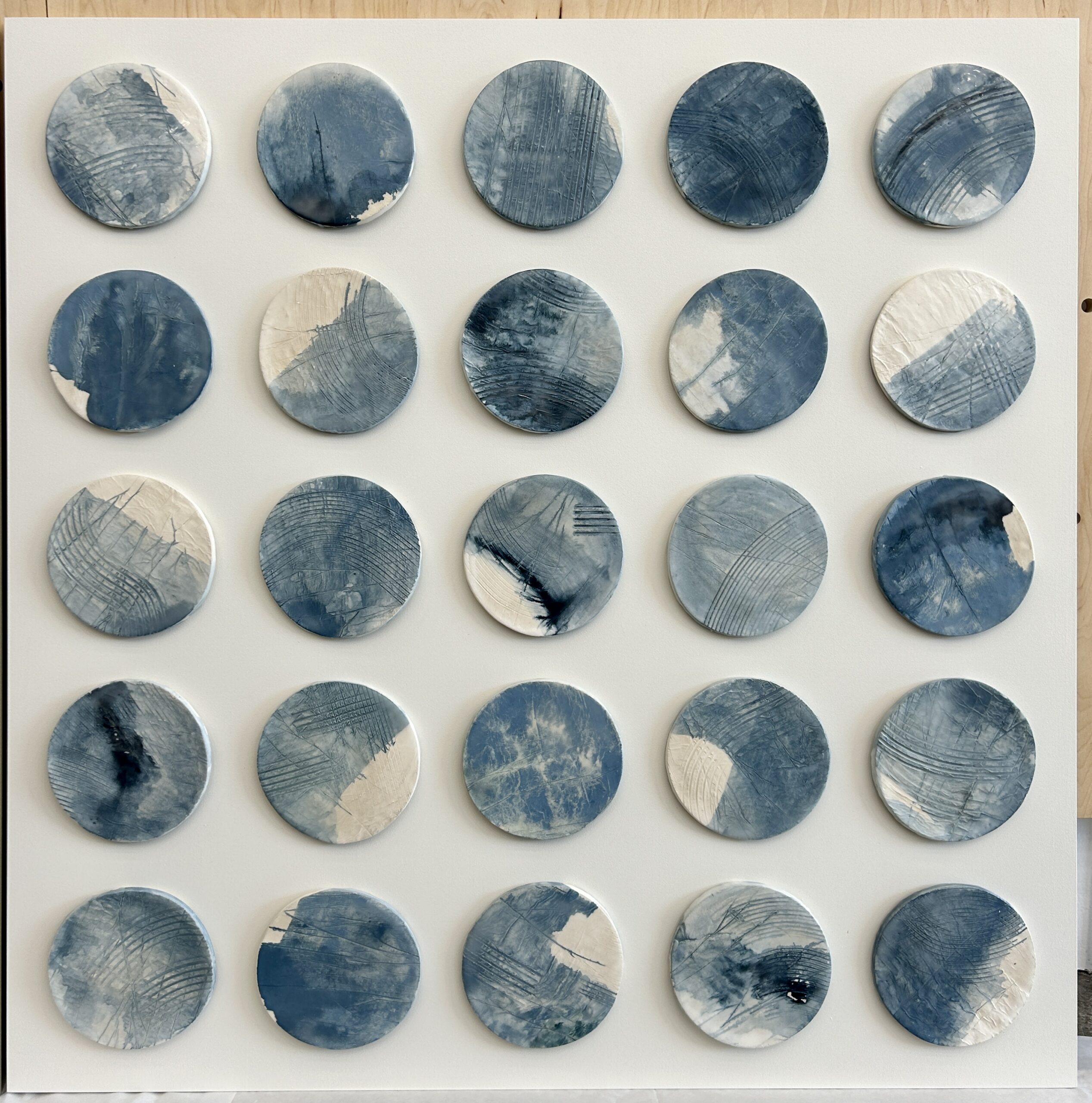 Emily Mann, Ink and Indigo, Custom Commisioned Paperclay and Encaustic Disks on Panel, set of 4, 38x38 each, custom art for luxury hospitality suites