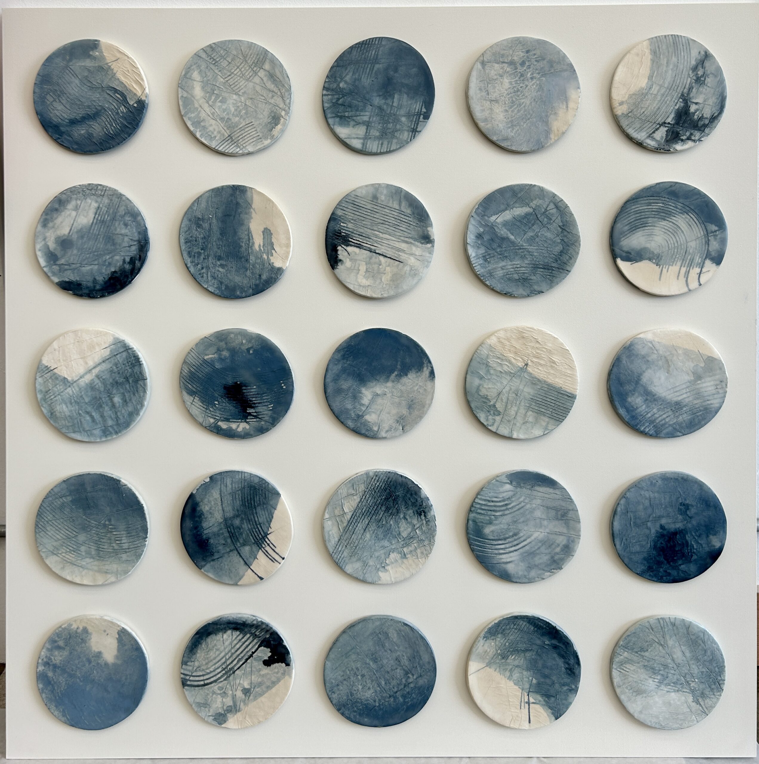 Emily Mann, Ink and Indigo, Custom Commisioned Paperclay and Encaustic Disks on Panel, set of 4, 38x38 each, custom art for luxury hospitality suites