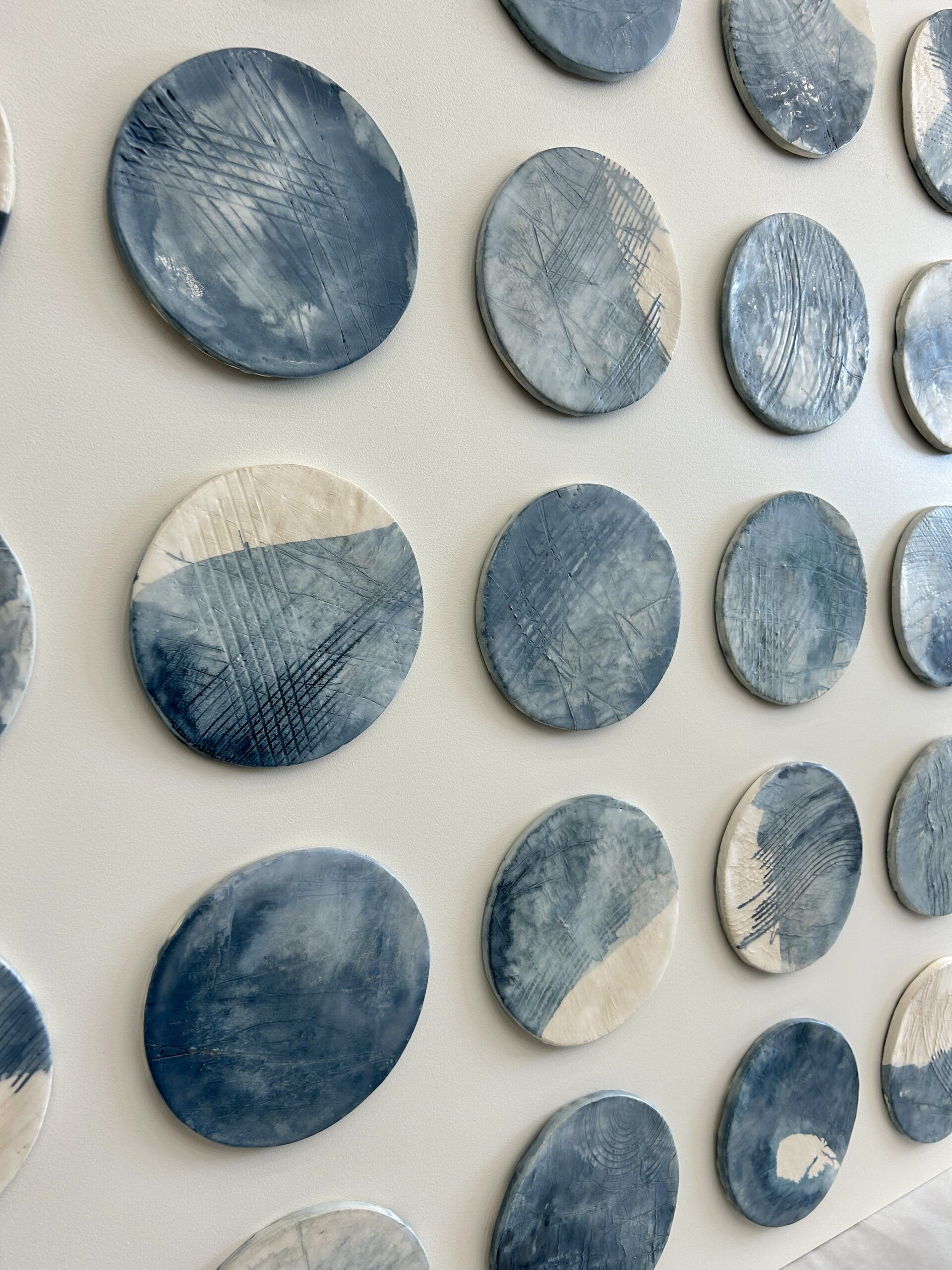 Emily Mann, Ink and Indigo, Custom Commisioned Paperclay and Encaustic Disks on Panel, set of 4, 38x38 each, custom art for luxury hospitality suites