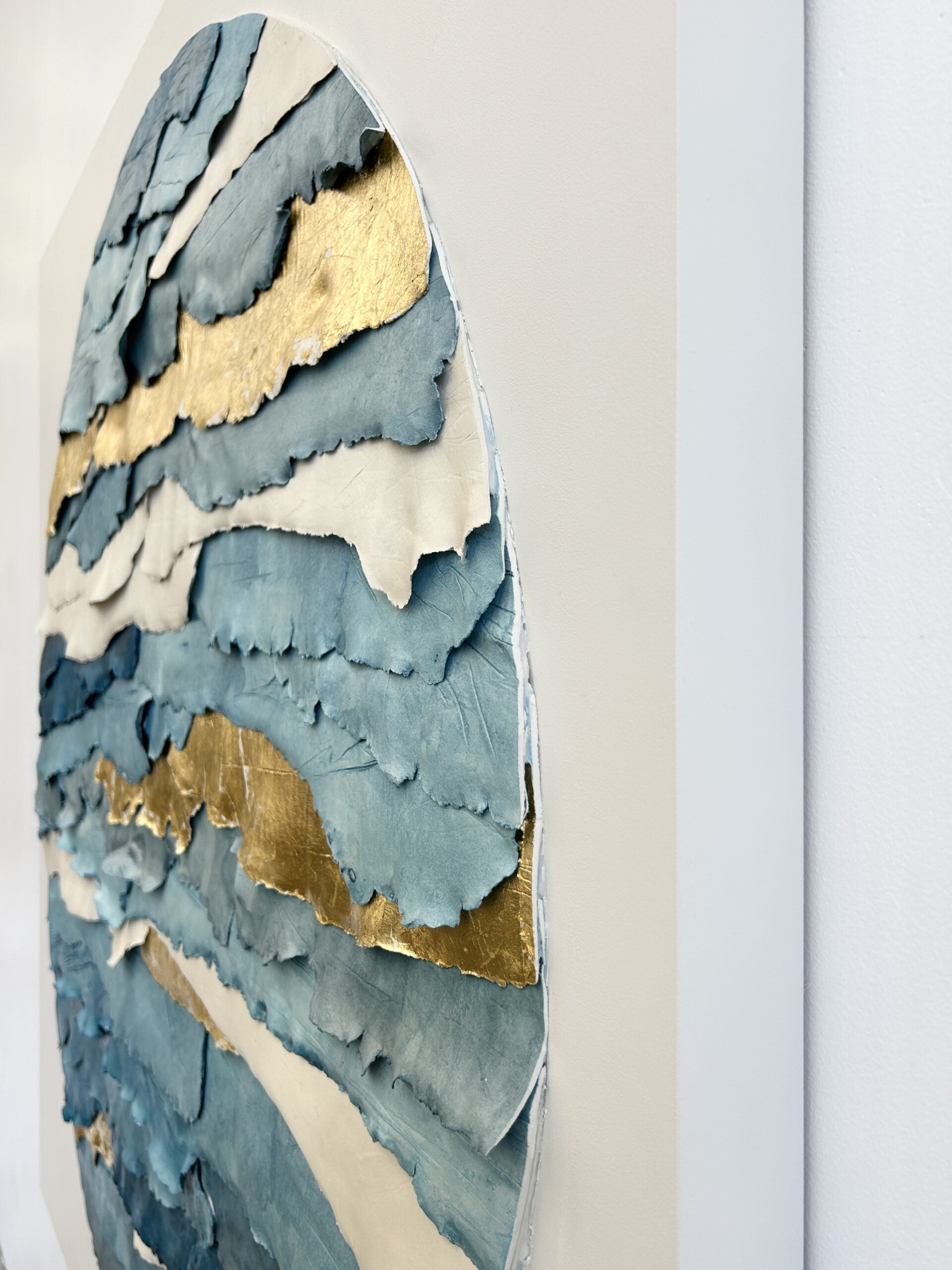 custom dimensional wall art by Emily Mann, Ink and Indigo, Circular Strata on Square Panel, Custom Dimensional Paperclay Assemblage with Watercolor and Gold Leafing on Cradled Panel, 45x45, side view