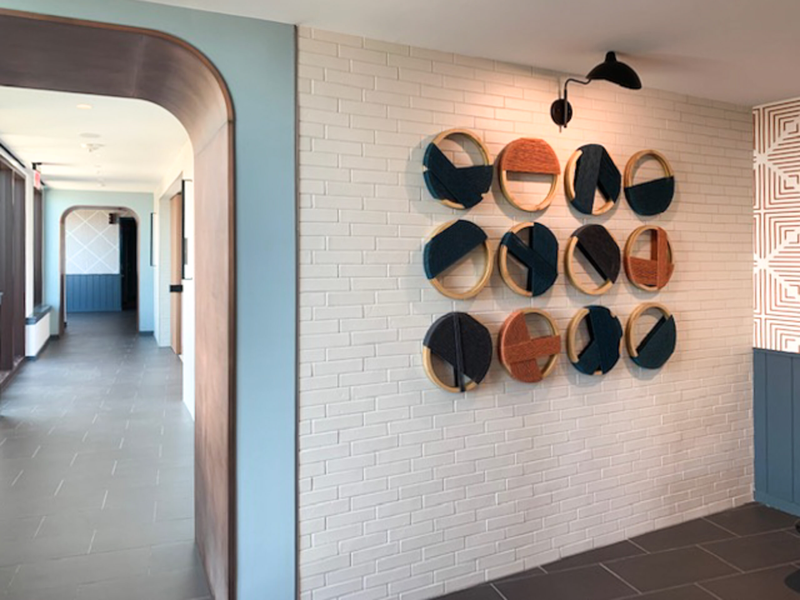 Emily Mann, Ink and Indigo, Custom Open Form String Art, cotton cord over custom stacked plywood 14" dia hoops, custom installation for multi family project
