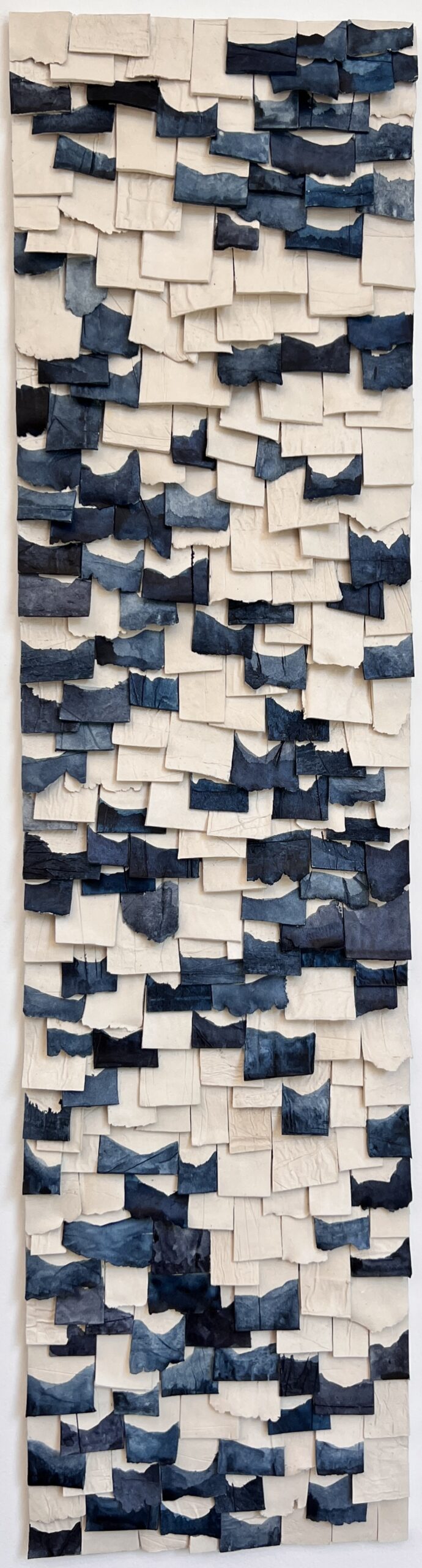 Custom dimensional artwork in Lamina style, paperclay with watercolor finish on wood backer, 40.25"h x 10.25"w by Emily Mann, Ink and Indigo