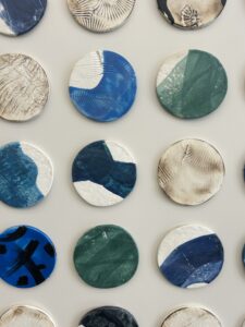 Custom Encaustic Coated Disks on Panel, Japanese Paperclay Disks with Impressions, Burnishing, and Encaustic, set of 3, 47.5 x 69.5 each, custom dimensional artwork for hospitality, corporate, and interiors projects