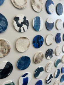 Custom Encaustic Coated Disks on Panel, Japanese Paperclay Disks with Impressions, Burnishing, and Encaustic, set of 3, 47.5 x 69.5 each, custom dimensional artwork for hospitality, corporate, and interiors projects