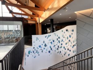 Emily Mann, Ink and Indigo, Custom Droplets Installation at Evermore Orlando, more than 100 paperclay droplets in mixed blues -12