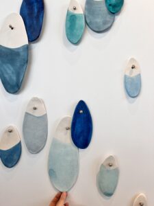 Emily Mann, Ink and Indigo, Custom Droplets Installation at Evermore Orlando, more than 100 paperclay droplets in mixed blues -5
