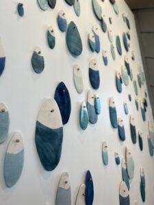 Emily Mann, Ink and Indigo, Custom Droplets Installation at Evermore Orlando, more than 100 paperclay droplets in mixed blues -5