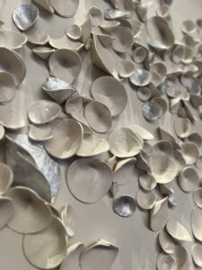 Emily Mann, Ink and Indigo, Custom Installation for Red Rock Casino High Limit, paperclay cups with silver leaf, approx 5’ x 14’ installation on curved wall-5