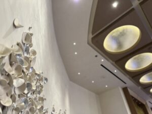 Emily Mann, Ink and Indigo, Custom Installation for Red Rock Casino High Limit, paperclay cups with silver leaf, approx 5’ x 14’ installation on curved wall-5