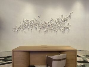 Emily Mann, Ink and Indigo, Custom Installation for Red Rock Casino High Limit, paperclay cups with silver leaf, approx 5’ x 14’ installation on curved wall-5