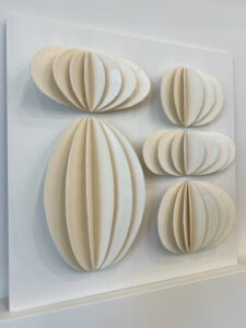 Ink and Indigo, Custom Dimensional Art for Hospitality and Interior Design, Fluted Forms in Natural (Sample) | dimensional mm sculptural paper and encaustic on panel | dimensions and finishes variable