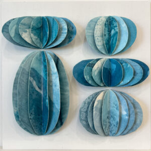 Ink and Indigo, Custom Dimensional Art for Hospitality and Interior Design, Fluted Forms in Blue (Sample) | dimensional mm sculptural paper and encaustic on panel | dimensions and finishes variable