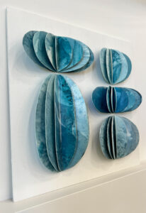 Ink and Indigo, Custom Dimensional Art for Hospitality and Interior Design, Fluted Forms in Blue (Sample) | dimensional mm sculptural paper and encaustic on panel | dimensions and finishes variable